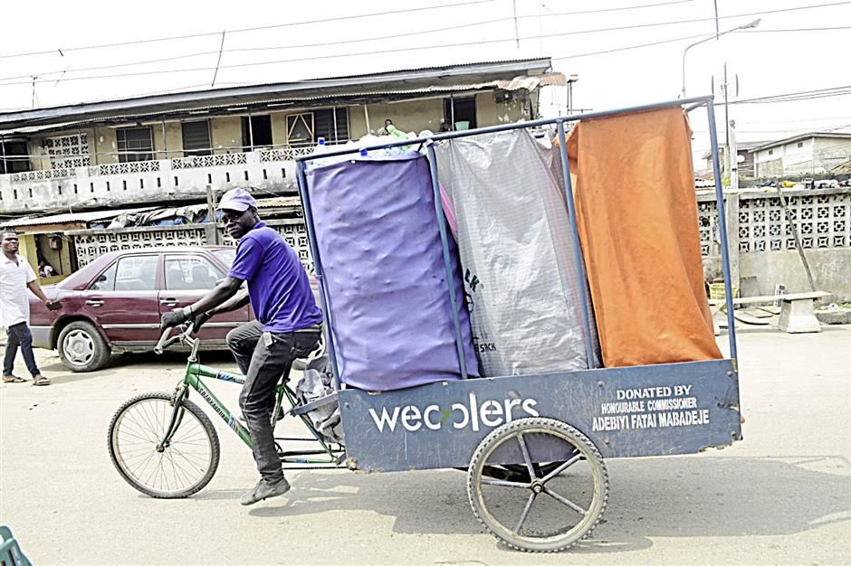 Una delle biciclette per la raccolta porta a porta di Wecyclers. Foto: The Star online
